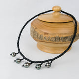 Black Choker with Five Baroque Tahitian Pearls around the Neck